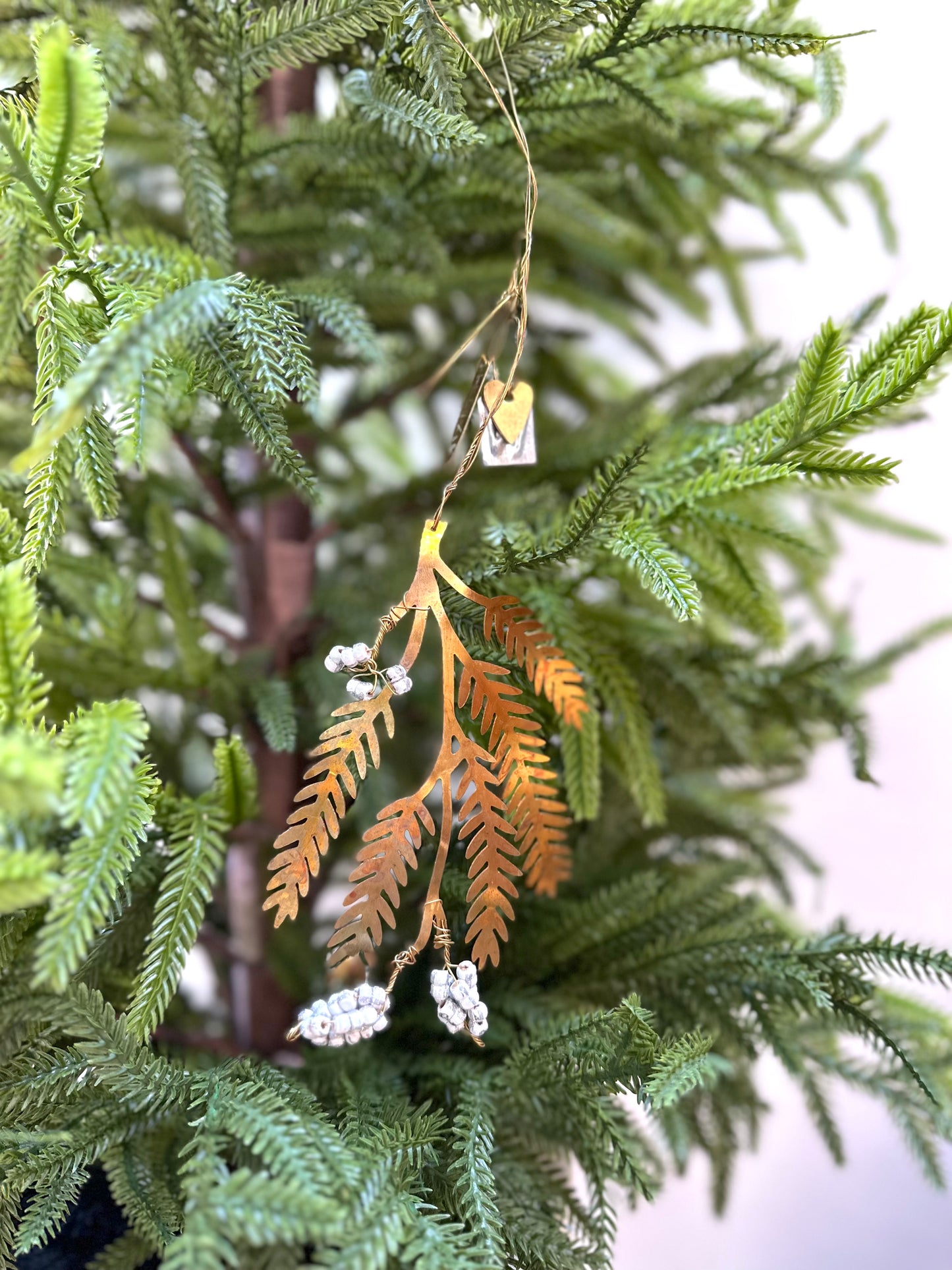 Walther & Co. Brass Pine Branch Ornament With White Berries